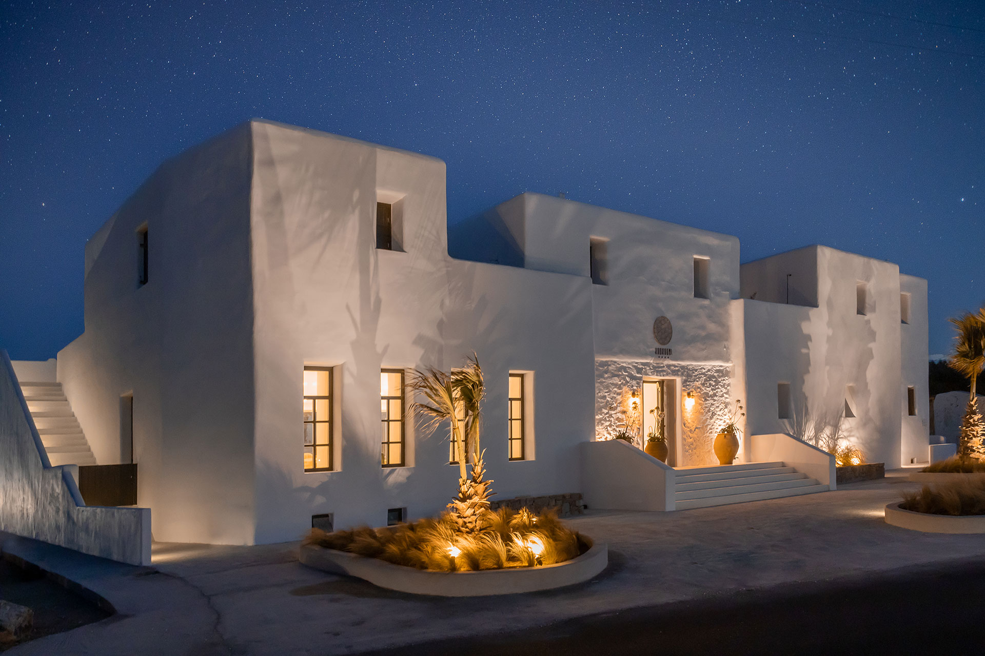 Koukoumi Vegan Hotel exterior at night