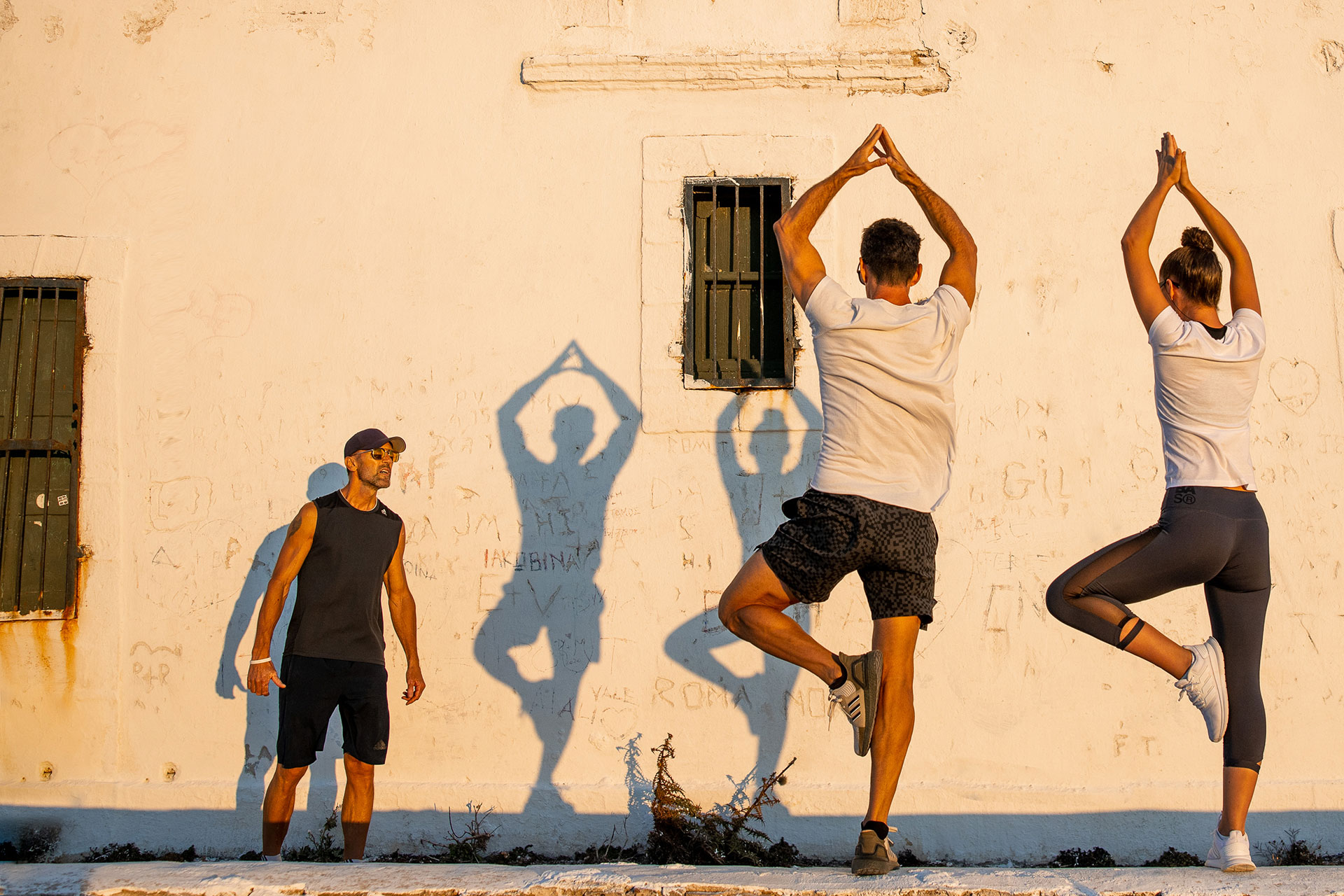 Koukoumi Vegan Hotel visitors doing yoga with an instructor