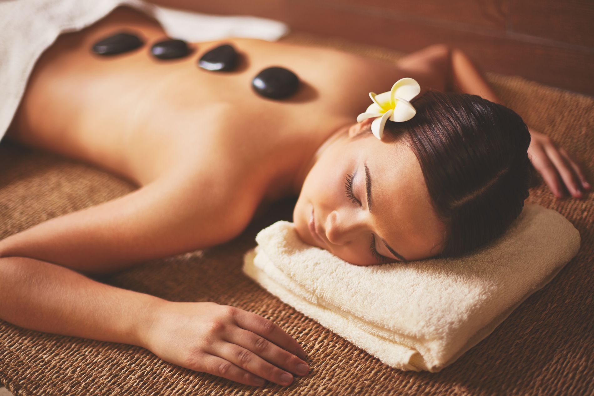 Woman Enjoying Stone Massage