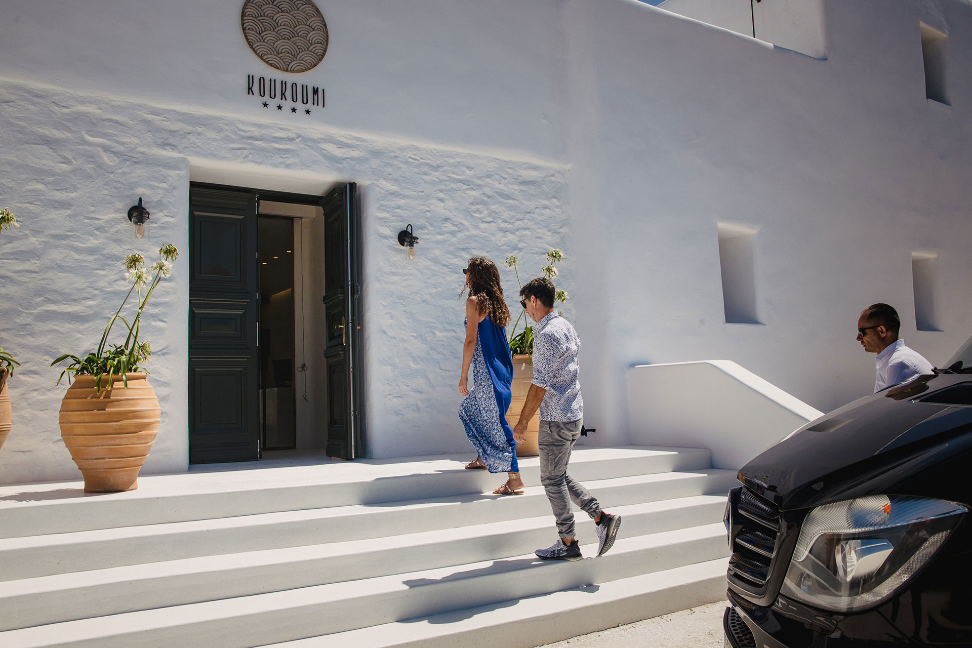 Koukoumi Vegan Hotel entrance and visitors